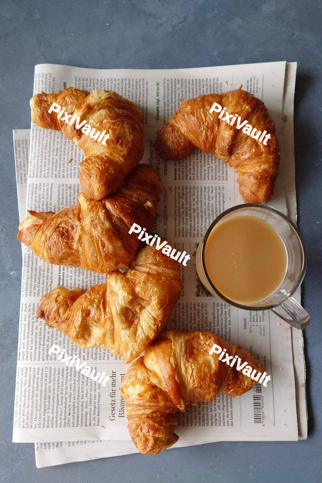 Croissants on a wooden chopping board